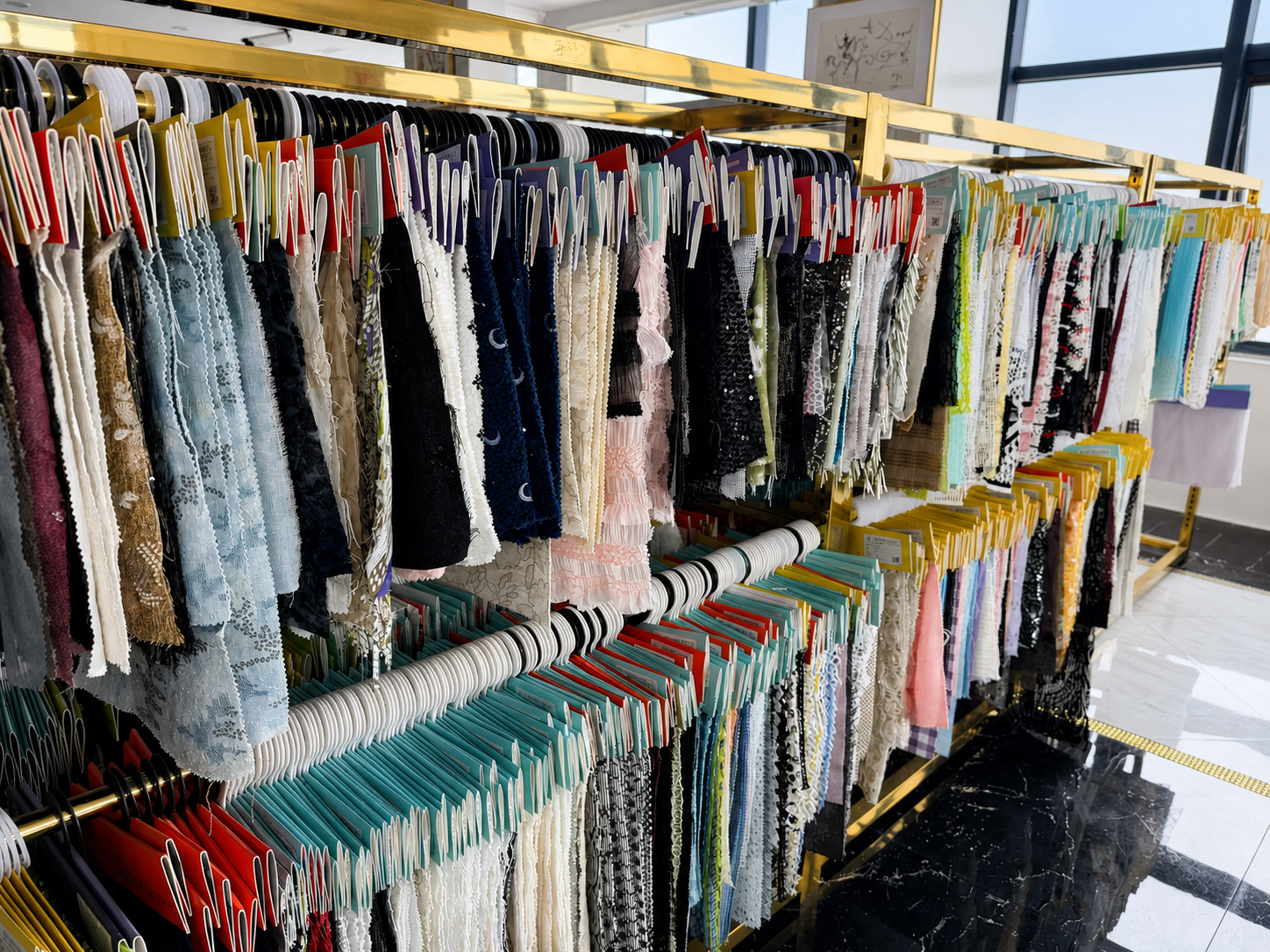 Organized fabric sample racks at Zhongwei Textile