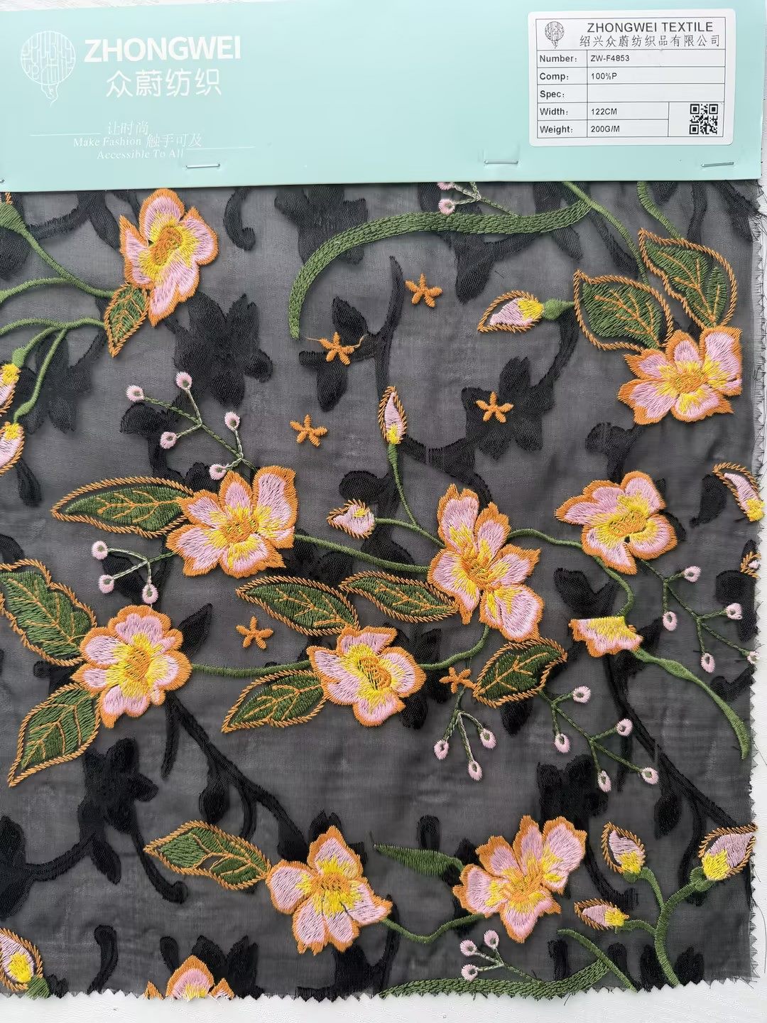 Floral embroidered mesh fabric sample
