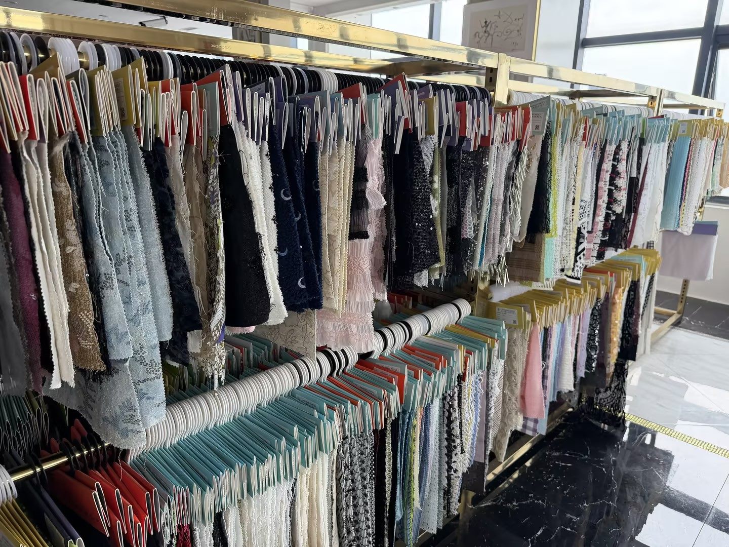 Fabric swatch rack with Zhongwei Textile sample cards